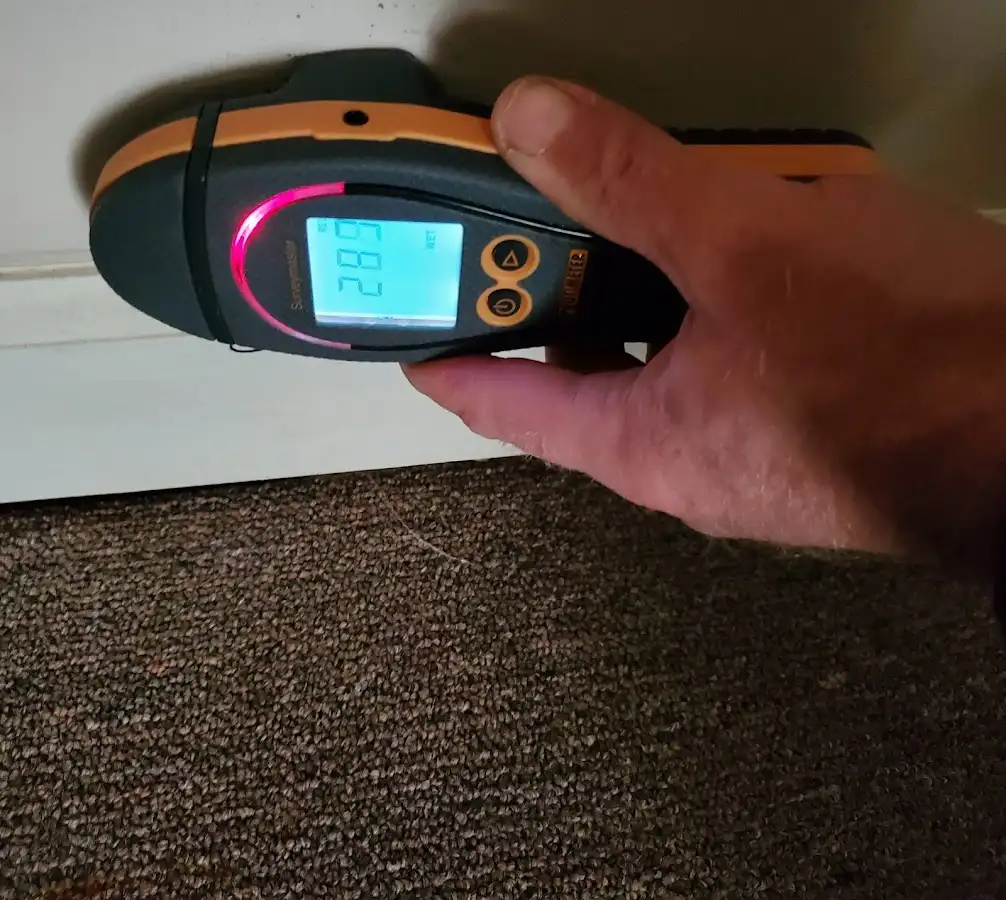 Moisture detection at baseboard during Storm Damage Restoration in Wildomar